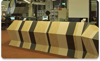 Information desk of library. desk is shaped with architectural design of Wave rock.